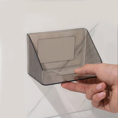 Mirrored Cabinet Organizer Bin - Smoke-tinted ribbed slanted storage bin held by a hand against a wall