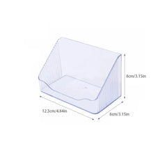 Mirrored Cabinet Organizer Bin - Clear slanted plastic storage organizer marked with dimensions 12.3cm by 8cm by 8cm.