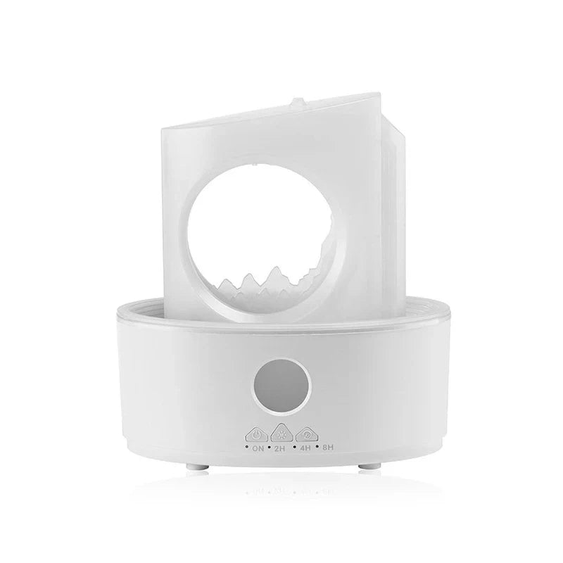 Cool Mist Humidifier Diffuser - Unpowered matte white unit showing control buttons, timer indicators, and mountain silhouette cutout on a plain white background