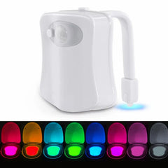 Motion Activated Night Light - White toilet light unit emitting cool blue light, with swatch previews of 8 available LED color options below the product