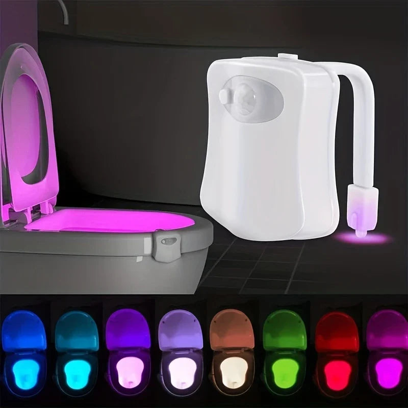Luz nocturna con sensor de movimiento: luz para inodoro instalada en un inodoro que demuestra iluminación rosa en la taza, con vistas previas de muestra de 8 opciones de color LED disponibles