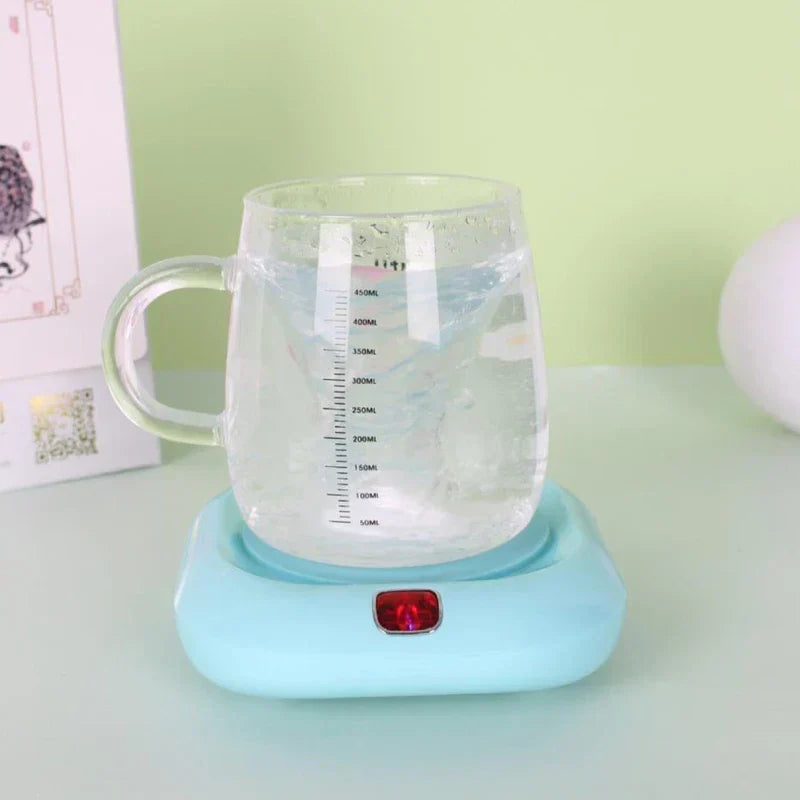posavasos individual - Taza medidora de vidrio transparente con agua y asa sobre una base agitadora magnética azul claro