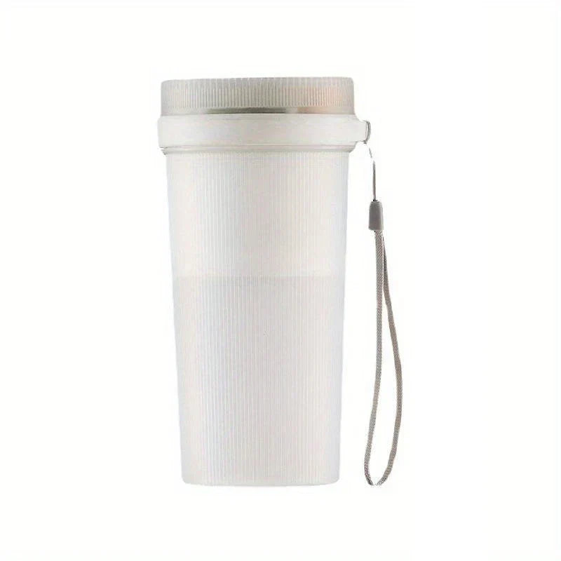 Matte white ribbed portable juicer blender with a matching lid and grey wrist lanyard, shown against a plain white background.