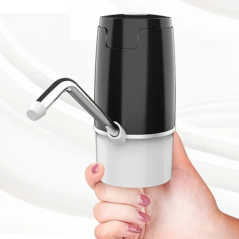 Water Jug Pump - Compact two-tone dispensing device held in a hand to show portable size