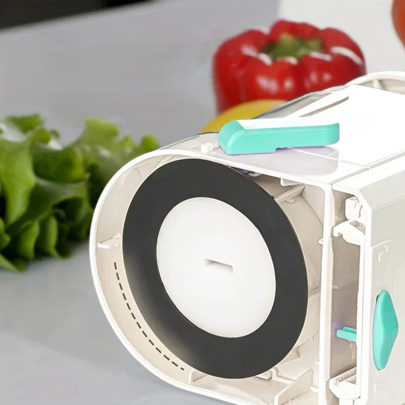 Vegetable Spiralizer Slicer - Close-up of a multi-functional vegetable cutter with white body and mint green accents, placed on a countertop with vegetables in the background