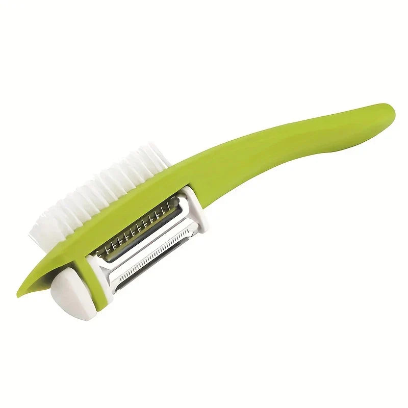 Serrated Vegetable Peeler - Green-handled dual-bladed kitchen peeler with white cleaning brush, white background