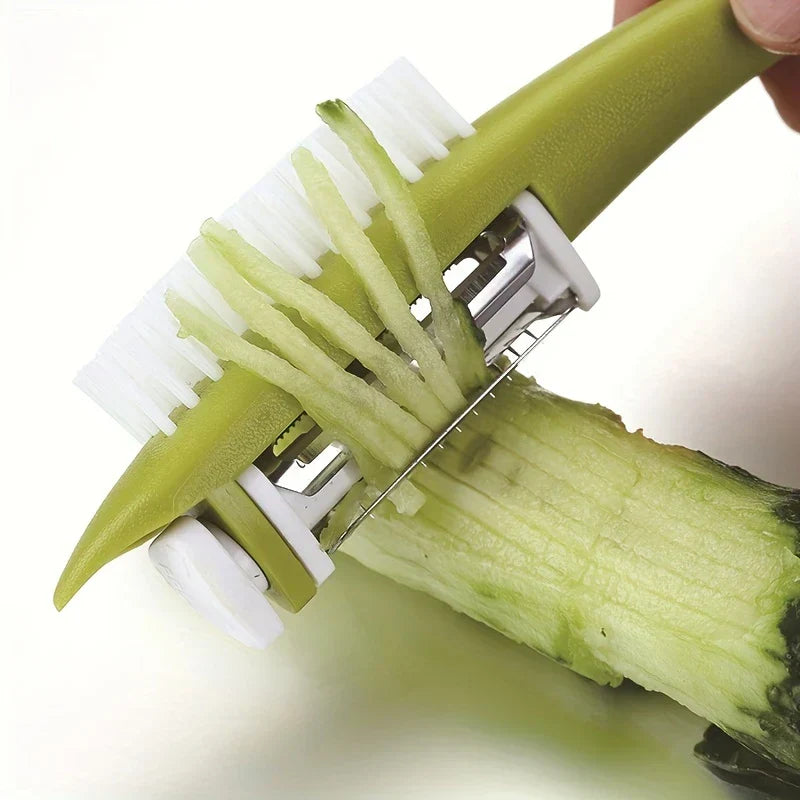 Serrated Vegetable Peeler - Green-handled peeler creating thin green strips from a cucumber, held by a hand