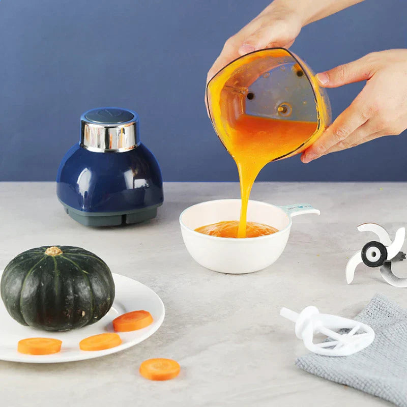 Smoothie Maker - Hands pouring blended orange puree from the blender jar into a small bowl, with whole squash, sliced carrot, and removable blender parts placed nearby on the counter