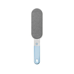A multifunctional cleaning brush with a light blue handle and oval mesh cleaning head stands upright against a plain white background.