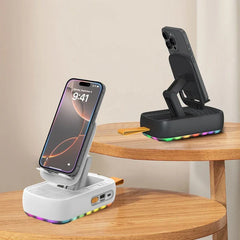 Car Phone Stand Holder - White and black foldable phone stands with smartphones, placed on stacked round wooden tables, with RGB lighting along their bases