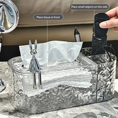 Tissue Box Holder - Clear textured tissue box with a chrome rabbit figurine, holding tissues and small items with labeled sections
