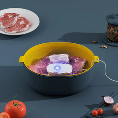Ultrasonic Cleaner Machine - A yellow and dark blue bowl of water with meat, a blue-lit white device inside, and a white cord extending out