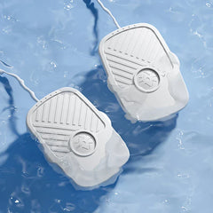 Ultrasonic Cleaner Machine - Two identical white ribbed wired devices partially submerged in light blue rippled water.