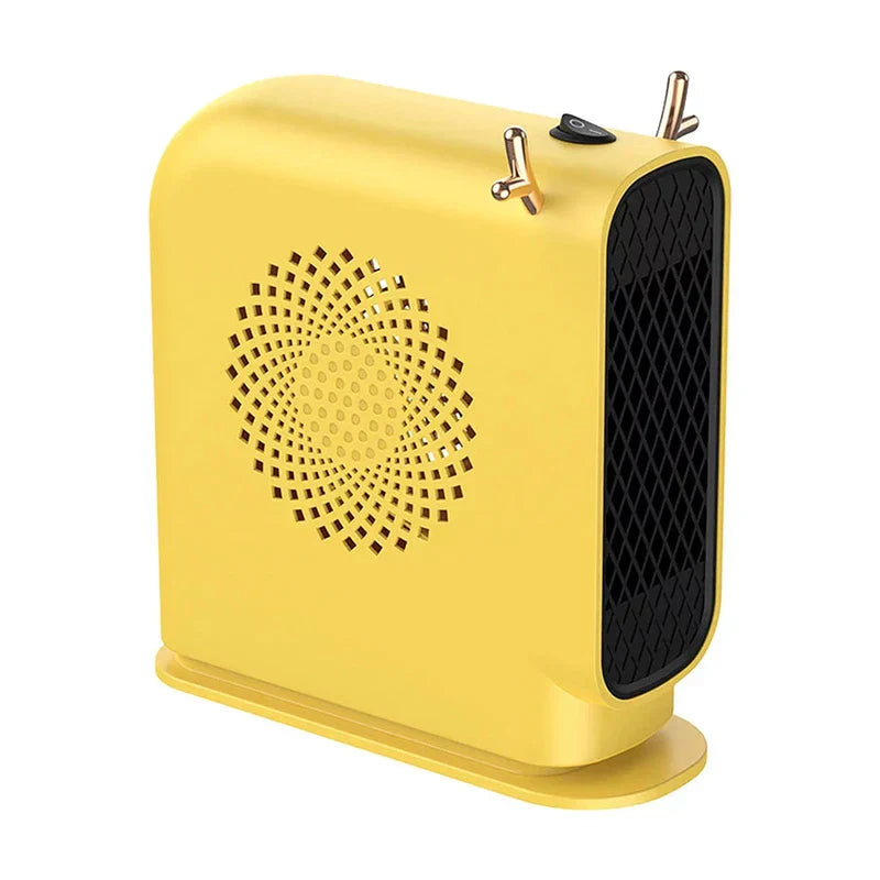 Space Heater Fan - Yellow compact heating unit with decorative antler-style accents, shown against a plain white background