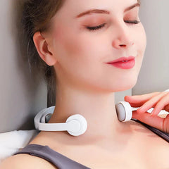 Neck Shoulder Massager - Person adjusting the wearable massage device positioned around their neck