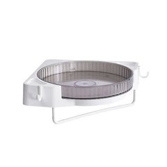White corner rotating shower caddy with hooks and towel bar, clear plastic tray, on plain white background