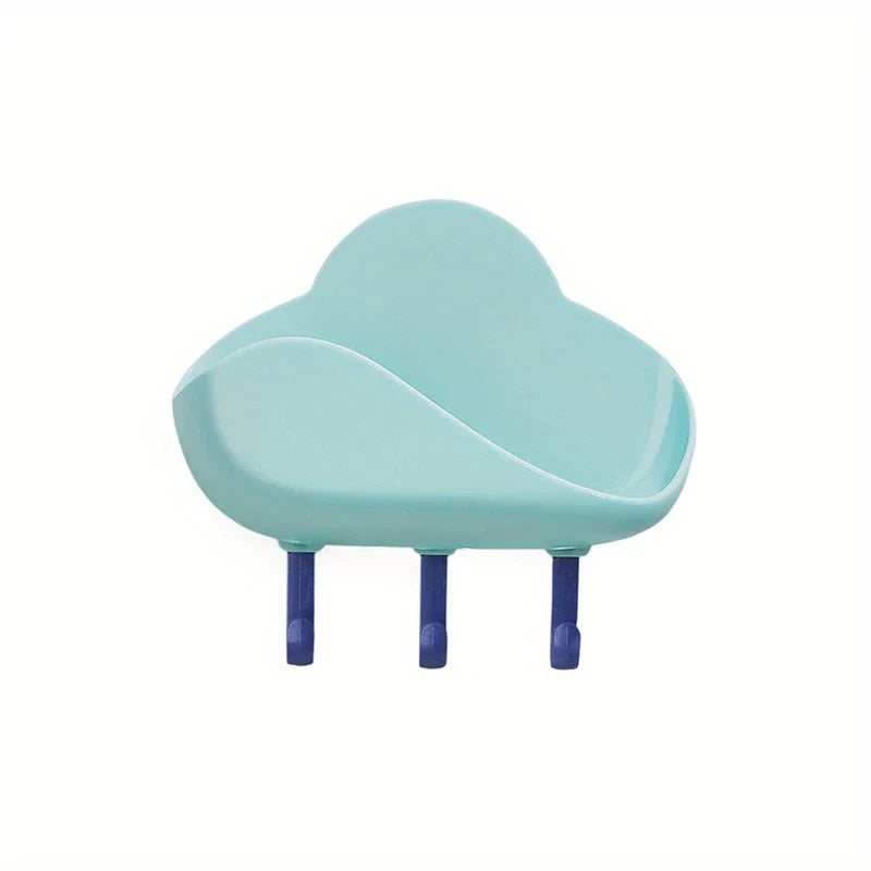 Cloud Wall Hooks - Light mint cloud-shaped wall mounted storage shelf with three dark blue hooks against white background