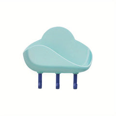 Cloud Wall Hooks - Light mint cloud-shaped wall mounted storage shelf with three dark blue hooks against white background