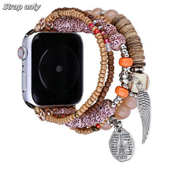 Apple Watch Band - Apple Watch attached to a multi-strand beaded watch strap in beige and brown tones, with wing, baseball, and Paris tag charms