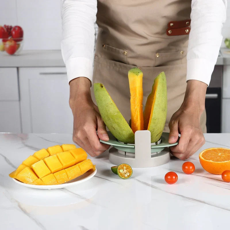 Fruit Slicer Set - mango being pitted and sliced on counter with cut produce nearby