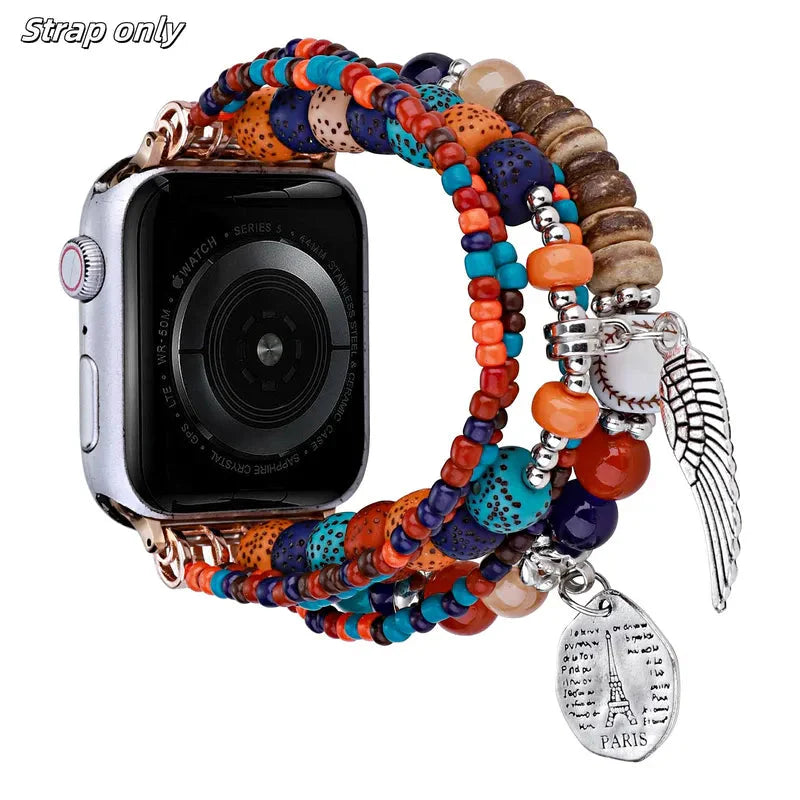 Apple Watch Band - Multicolor beaded wrap watch strap with Eiffel Tower Paris charm, wing charm, and baseball accent attached to a silver smartwatch