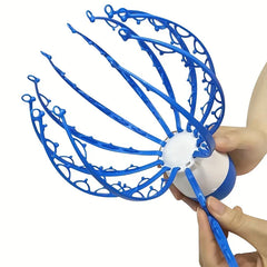 Head Scalp Massager - Hand holding an electric scalp massager, showing its blue flexible claw-shaped massage arms spread open.