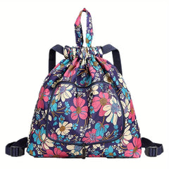 Travel Backpack - Navy floral print drawstring backpack with top handle, shoulder straps and front zip pocket, front view against white background