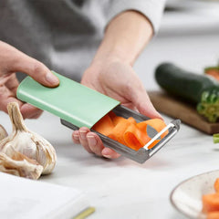 Peeler With Storage Container Catcher Box