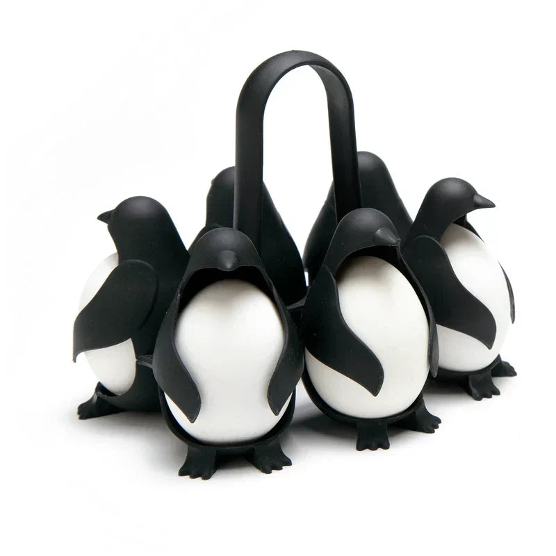 Egg Cooker - Black penguin-shaped holder cradling six white eggs with a curved carry handle