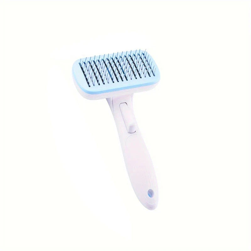 Light blue and white deshedding brush with metal pins shown on a plain white background