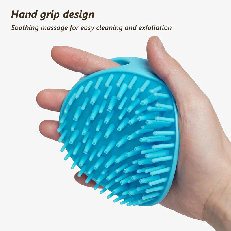 Pet bath massage brush with shampoo dispenser held in hand