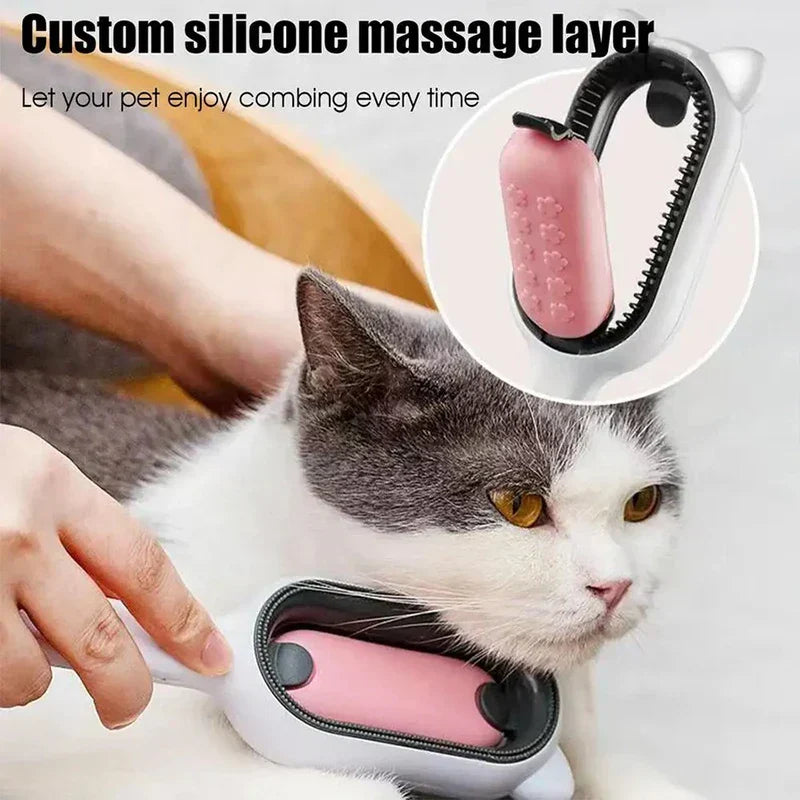 Hand holding the pink-insert pet grooming brush near a grey and white cat, closeup of the textured silicone massage insert