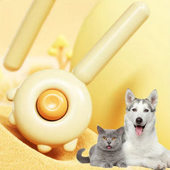 Pet Grooming Brush For Dogs - Cream pet brush displayed alongside a gray cat and gray-and-white dog on soft yellow fabric