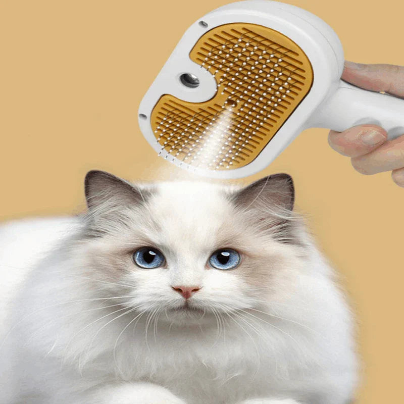 Deshedding Rake - Hand holding the grooming tool above a long-haired cat with light fur and blue eyes