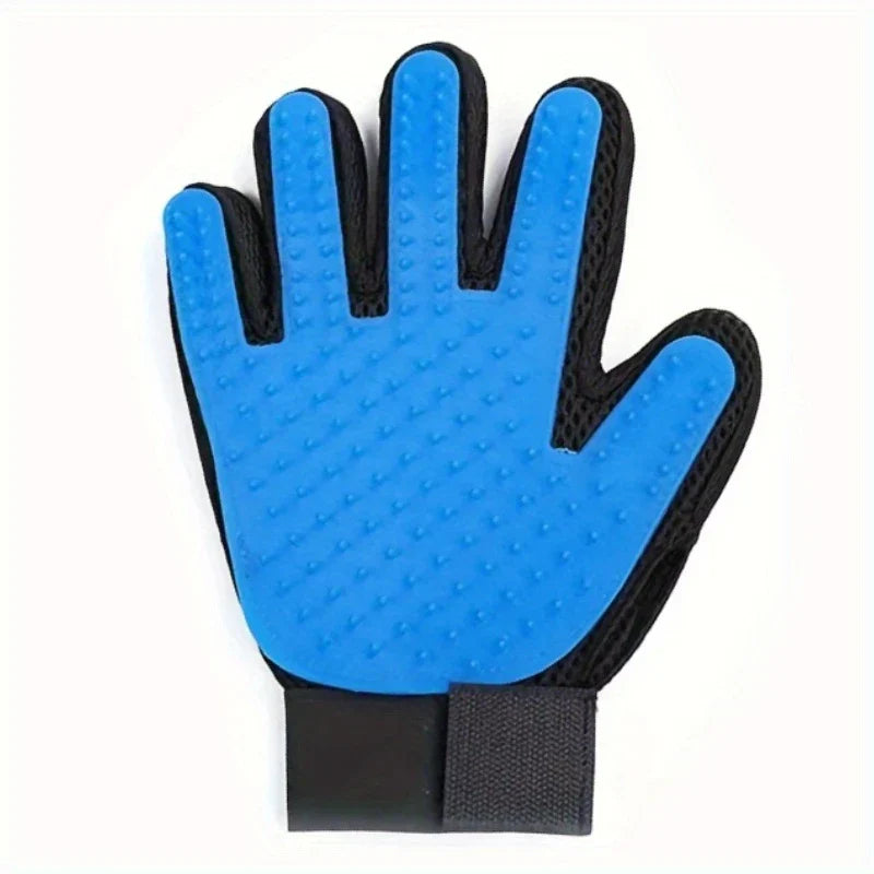 A single pet grooming deshedding hair remover mitt with blue nubbed palm and black mesh backing is laid flat on a white background.