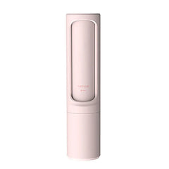 Pet hair remover brush roller on a couch surface
