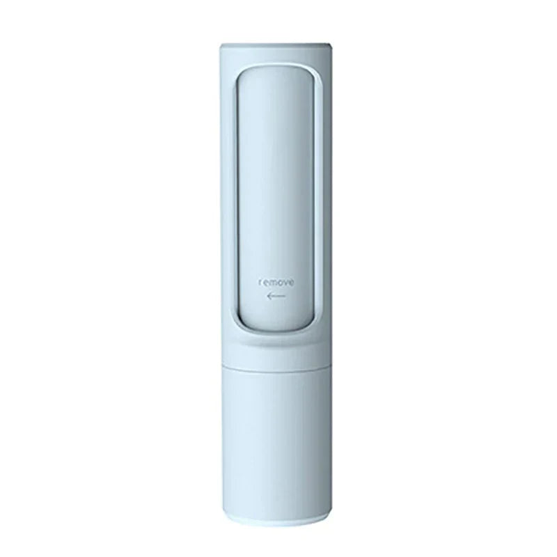 Light blue cylindrical pet hair remover brush with a removable panel marked 'remove' and an arrow indicator