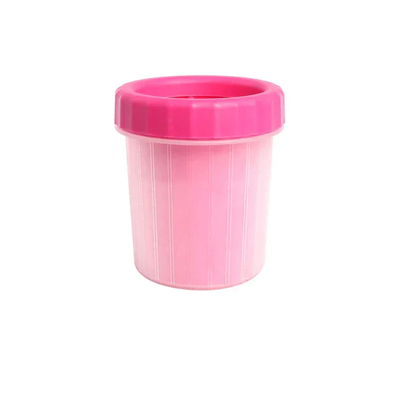 Pink pet paw cleaner cup with darker pink top lid, on plain white background