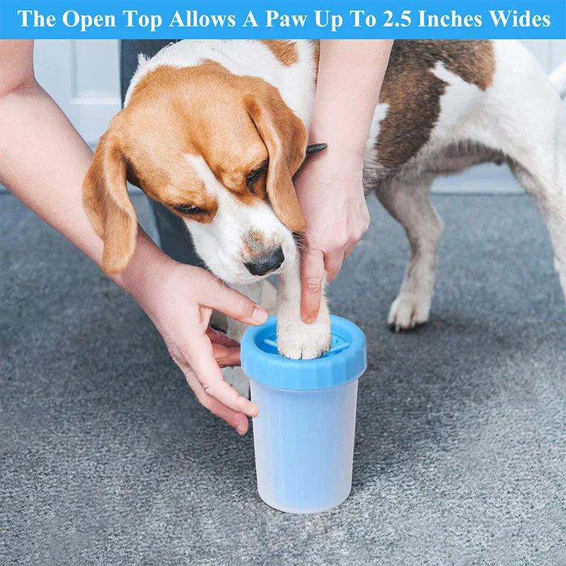 Person inserts a dog's paw into a blue pet paw cleaner cup, with size note about 2.5 inch wide top