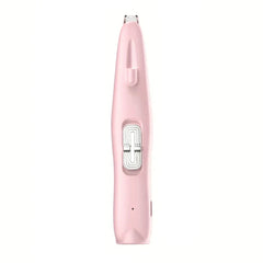 Pet paw hair trimmer held near a dog's paw