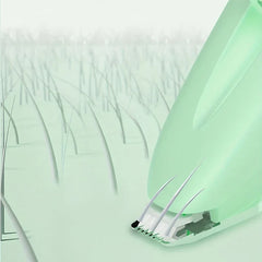 A magnified rendering of a light green hair trimmer blade cutting fine hairs, shown in a stylized close-up scene.