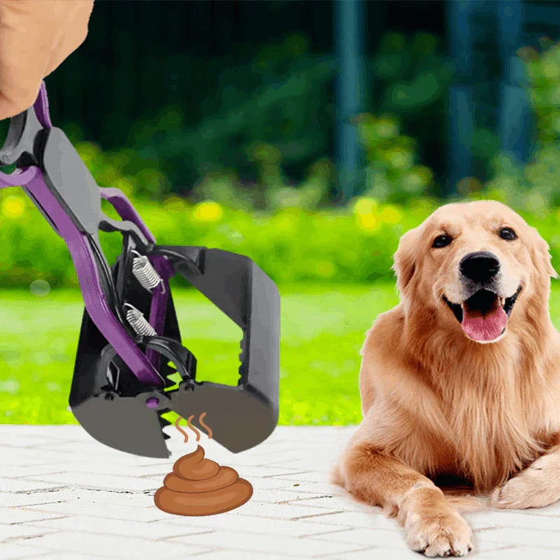 Close-up of the jaw grabber tool picking up pet waste