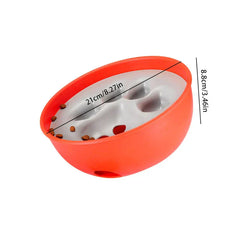 Orange and gray bowl slow feeder with kibble, 21cm diameter and 8.8cm height marked.