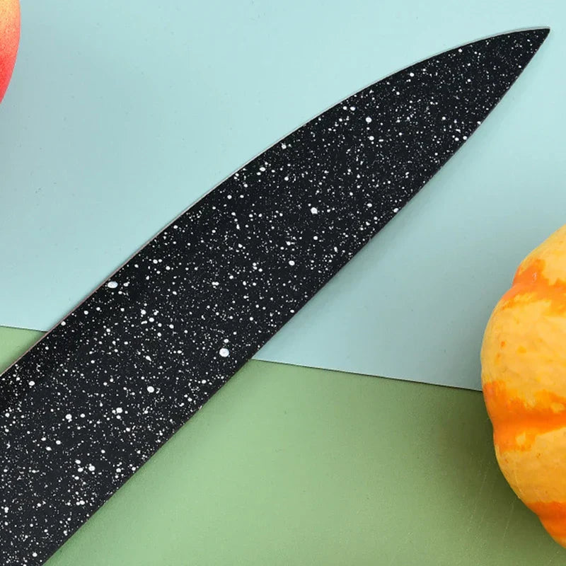 Kitchen utensil set displayed with modern tableware