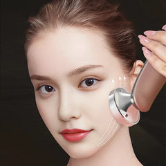 Close-up of the facial rejuvenation massager handpiece
