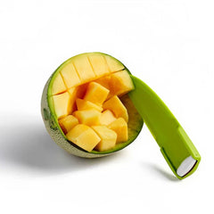 Green plastic melon slicer resting on a halved cantaloupe filled with cut melon cubes