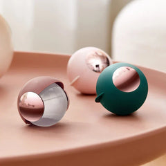 Travel-ready clothes lint remover roller on a table