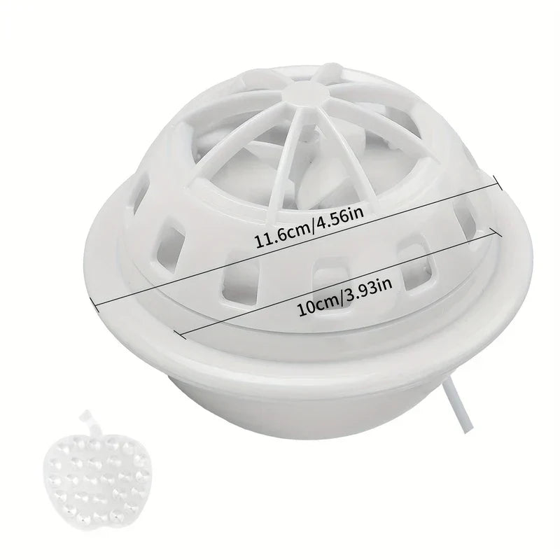 Mini dishwasher with size measurements and a small apple-shaped accessory on a plain background