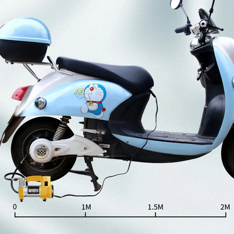 Yellow electric air pump connected to inflate rear tire of blue cartoon-decorated electric scooter