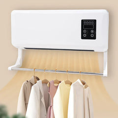 White wall-mounted fan heater blowing warm air, with clothes hanging on an attached drying rack